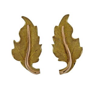 Mario Buccellati Yellow Gold Leaf Stud Earrings: METAL: 18k Gold. MEASUREMENTS: Earrings are 20mm x 9mm. MARKED:M. Buccellati, Italy, 750. WEIGHT: 2.9 grams. Gemstones have not been graded for color and clarity ,and tested for clarity and color enha