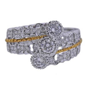 Mario Buccellati Diamond White Yellow Gold Ring: METAL: 18k White and Yellow Gold. GEMSTONES: Diamonds approx. 0.60ctw. MEASUREMENTS: Ring size - 6.5, ring top is 13mm wide. MARKED: M. Buccellati, Italy, 750. WEIGHT: 5.5 grams. Gemstones have not be