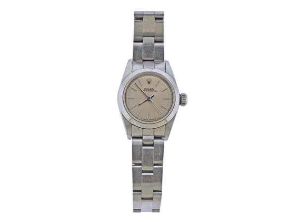 Rolex Oyster Stainless Steel Watch ref. 16807: METAL: Stainless Steel. MEASUREMENTS: Case - 25mm, Band will fit up to 7" wrist. Silvered Rolex dial with stick markers, crown original. MOVEMENT: Automatic, working order. Ref. 16807. R72***2.Wa