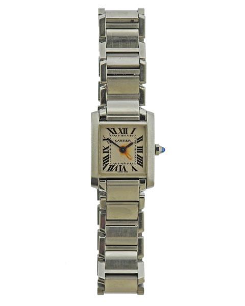 Cartier Tank Francaise Steel Watch CO1018: METAL: Stainless Steel. MEASUREMENTS: Case - 20mm excl crown x 25mm. Band will fit 7" wrist. Rust on the dial. MOVEMENT; Quartz, has rust - not working. Hands not moving. Retail $3250. Comes with