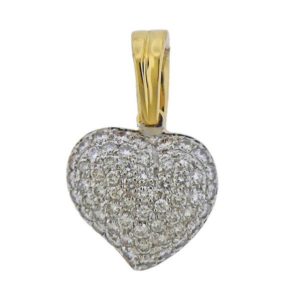 Chimento 18K Gold Diamond Heart Pendant: METAL: 18k Gold. GEMSTONE: Diamonds approx. 0.72ctw. MEASUREMENTS: Pendant is 22mm long x 14mm wide. MARKED: Chimento 750 408VI. WEIGHT: 3.6 grams.Gemstones have not been graded for color and clarity