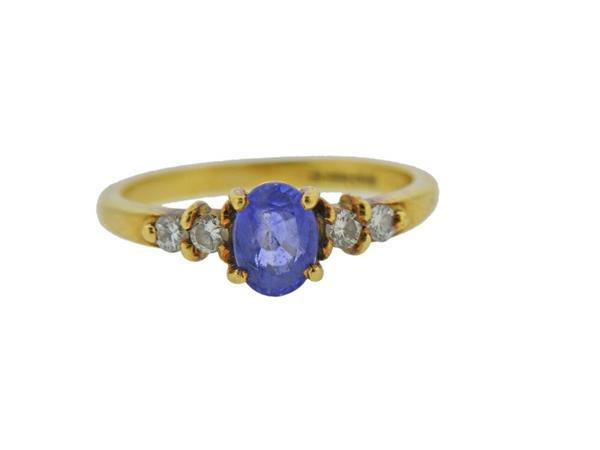 18k Gold English Diamond Sapphire Ring: METAL: 18k Gold. MEASUREMENTS: Ring size is 6.5. GEMSTONES: Diamonds approx. 0.22ctw, Sapphire - 7mm x 5.1mm approx. MARKED: With English marks, 750. WEIGHT: 3.3 grams.Gemstones have not been graded f
