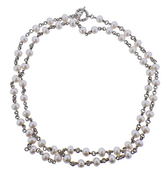 Silver Pearl Toggle Long Necklace: METAL: Silver. GEMSTONES: Pearls - 8.8mm to 9.5mm. MEASUREMENTS: Necklace is 43" long. TESTED: Silver. WEIGHT: 88.6 grams.Gemstones have not been graded for color and clarity ,and tested for clar