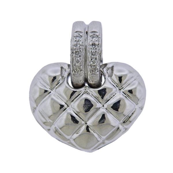 Chimento 18k White Gold Diamond Heart Pendant Charm: METAL: 18k Gold. MEASUREMENTS: Pendant - 18mm x 15mm. GEMSTONES: Diamonds- 0.04ctw. MARKED: Chimento, 408 VI, 750. WEIGHT: 4.5 grams. Retail $1660.Gemstones have not been graded for color and clarity