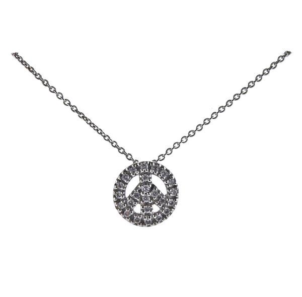 18K Gold Diamond Pendant Peace Sign Necklace: METAL: 18k Gold. GEMSTONES: Diamonds approx. 0.12ctw. MEASUREMENTS: Necklace is 17.5" long , Pendant - 9.2mm wide in diameter. MARKED: 18k, 750. WEIGHT: 2.6 grams.Gemstones have not been graded f
