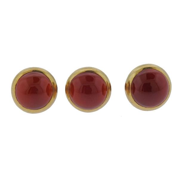 18K Gold Carnelian Buttons Set: METAL: 18k Gold. GEMSTONES: Carnelians. MEASUREMENTS: Buttons top - 8.5mm wide in diameter. MARKED: French Eagle Hallmarks. WEIGHT: 5 grams.Gemstones have not been graded for color and clarity ,and te