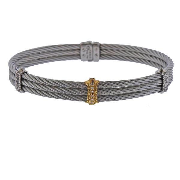 Charriol 18K Gold Steel Diamond Bracelet: METAL: 18k Gold and Stainless steel. GEMSTONES: Diamonds approx. 0.02ctw. MEASUREMENTS: Bracelet is 7.25" long x 8mm wide. MARKED: Charril Au 750 Steel. WEIGHT: 15.7 grams.Gemstones have not been