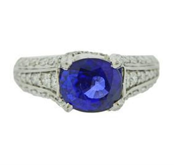 A. Jaffe AGL 3.55ct Sapphire Platinum Diamond Ring: METAL: Platinum. GEMSTONES: set with an AGL certified 3.55ct blue sapphire, surrounded with approx. 0.80ctw in diamonds. MEASUREMENTS: Ring size - 6, ring top - 8.5mm wide. MARKED: Makers mark, 54,Pla