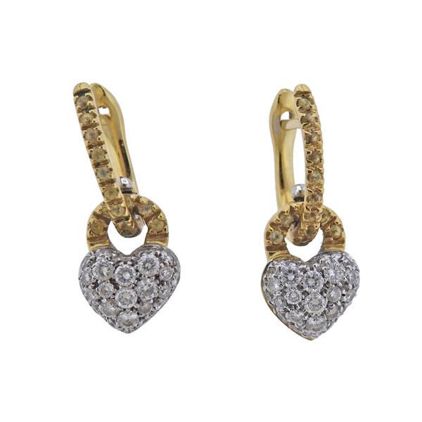 18k Gold White Yellow Diamond Heart Earrings: METAL: 18k Gold. MEASUREMENTS: Earrings are 23mm x 10mm. GEMSTONES: Yellow and white diamonds approx. 0.70ctw. MARKED: 750, Italian mark. WEIGHT: 6.6 grams. Gemstones have not been graded for color an