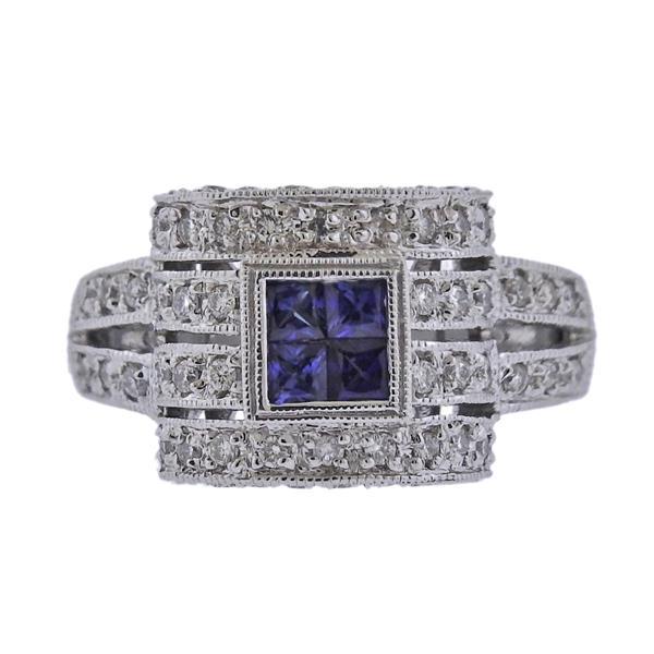 18k Gold Diamond Sapphire Ring: METAL: 18k Gold. MEASUREMENTS: Ring size - 4, ring top is 11.5mm x 13mm. GEMSTONES: Diamonds approx. 0.50ctw, Sapphire. MARKED: BA, 18k. WEIGHT: 7 grams.Gemstones have not been graded for color and cl