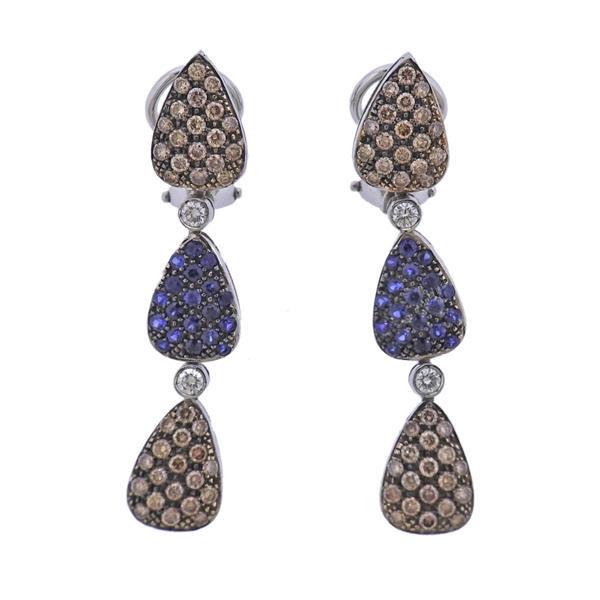 18K Gold Fancy White Diamond Sapphire Earrings: METAL: 18k Gold. GEMSTONES: White diamonds approx. 0.16ctw, Fancy diamonds approx. 1.00-1.20ctw. Sapphires. MEASUREMENTS: Earrings are 43mm x 9mm at widest point. MARKED: Maker's mark 750. WEIGHT: