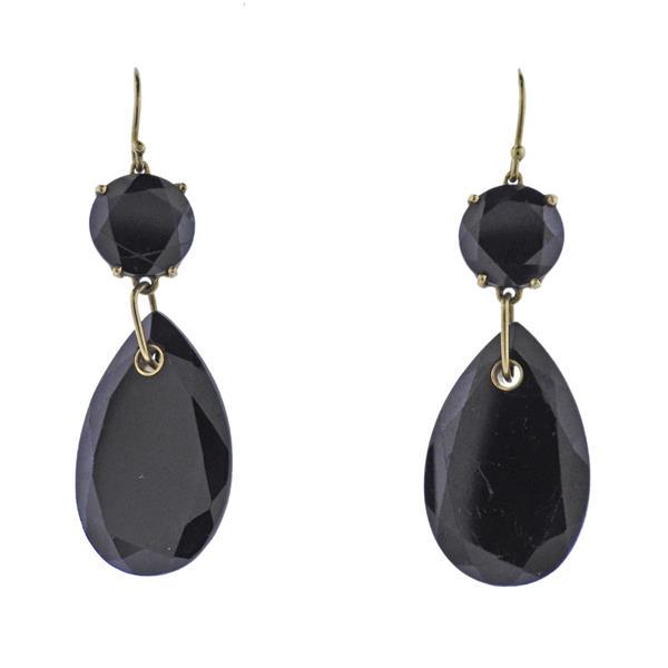 Ippolita 18K Gold Onyx Drop Earrings: METAL: 18k Gold. GEMSTONES: Onyx (stones are slightly abraded/chipped). MEASUREMENTS: Earrings are 50mm long. MARKED: Ippolita 18k. WEIGHT: 10.9 grams.Gemstones have not been graded for color and clar