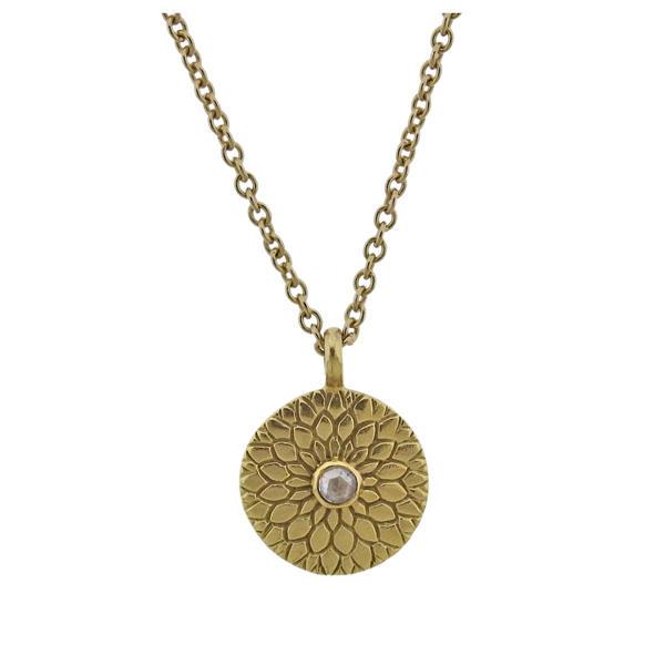 ME & Ro 18k Gold Diamond Lotus Pendant Necklace: METAL: 18k Gold. MEASUREMENTS: Necklace is 18" long, pendant is 13mm in diameter. GEMSTONES: Rose cut diamond. MARKED: ME & Ro, 18k. Retail $2150. WEIGHT: 5.5 grams.Gemstones have not been gr