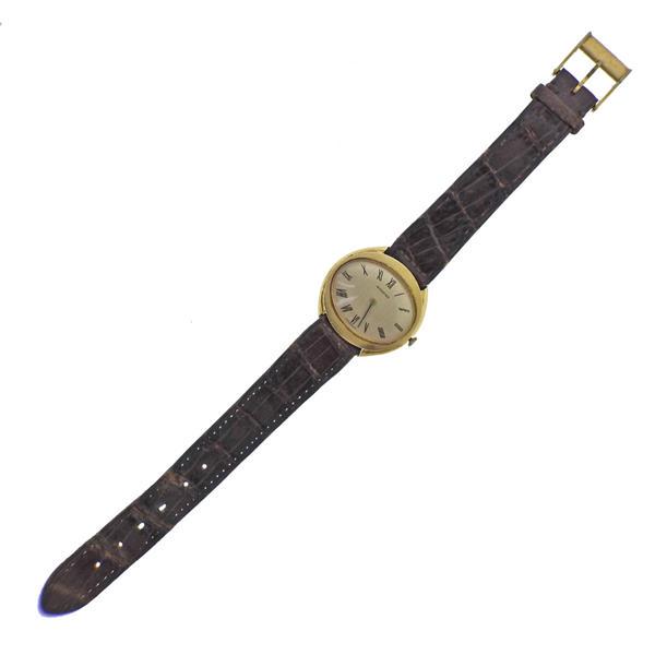 Movado 1970s 18k Gold Classic Watch 2555 191: METAL: 18k Gold. MEASUREMENTS: Case is 31mm excl crown x 29mm lug end to end. Audemars Piguet leather band in used but wearable condition, Movado gold plated buckle. Band is 7 5/8" long. Gold ton