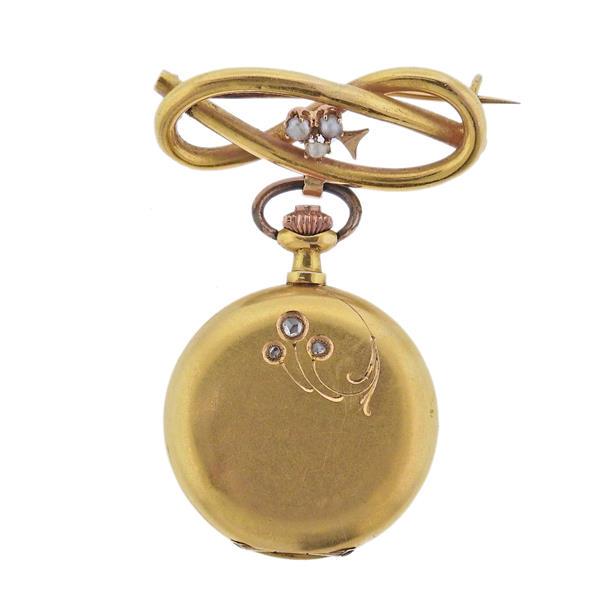 18k Gold Louis Audemars Diamond Pocketwatch: METAL; 18k Yellow Gold. MEASUREMENTS: Case - 27mm x 48mm, pin measures 32mm long. No crystal. MOVEMENT: Manual- working order, movement is dry and needs service, stops and goes. Weight - 19.5 grams. W