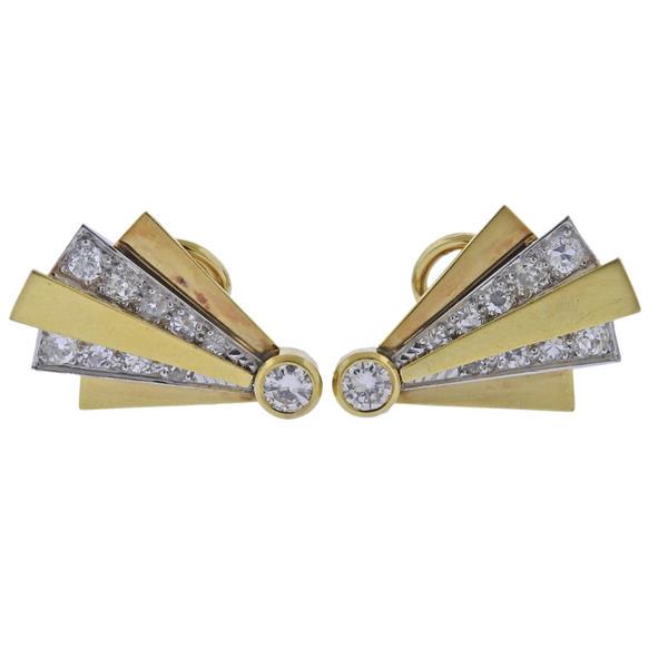 Puig Doria 18K Gold Diamond Earrings: METAL: 18k two tone gold. GEMSTONES: Diamonds approx. 1.06ctw. MEASUREMENTS: Earrings are 25mm x 18mm. MARKED: Puig Doria 750. WEIGHT: 9.5 grams.Gemstones have not been graded for color and clarity ,a