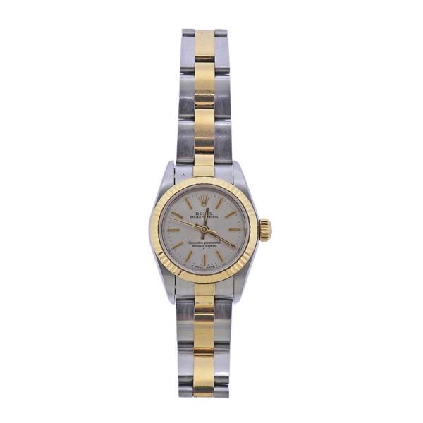 Rolex Oyster 18k Gold Steel Lady's Watch ref. 67193: METAL: 18k Gold./Stainless Steel. MEASUREMENTS: Case 26mm, two tone oyster band will fit approx. 7" wrist. Silvered dial with gold stick markers. MOVEMENT; Automatic, working order. ref. 67193, s
