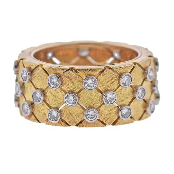 Tobias 18K Gold Diamond Band Ring: METAL: 18k Gold. GEMSTONES: Diamonds approx. 0.40ctw. MEASUREMENTS: Ring size 5 1 4, ring band is 9mm wide. MARKED: Tobias. WEIGHT: 8.7 grams. Gemstones have not been graded for color and clarity ,and