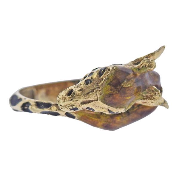 18k Gold Enamel Giraffe Ring: METAL: 18k Gold. MEASUREMENTS: Ring size 6.25, ring top is 11mm wide. Loss of enamel is present. MARKED: With gold punchmarks on the outside of the shank. WEIGHT: 8.3 grams.Gemstones have not been gra