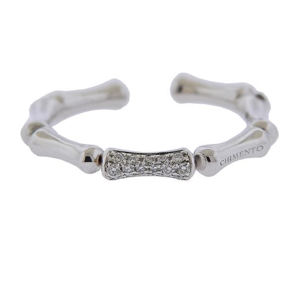 Chimento 18k Gold Diamond Bamboo Band Ring: METAL: 18k Gold. MEASUREMENTS: Ring size - 7.75 (slightly flexible), ring is 2.8mm wide. GEMSTONES: Diamonds approx. 0.10ctw. MARKED: Chimento, 408 VI, 750. WEIGHT: 2 grams.Gemstones have not been gra