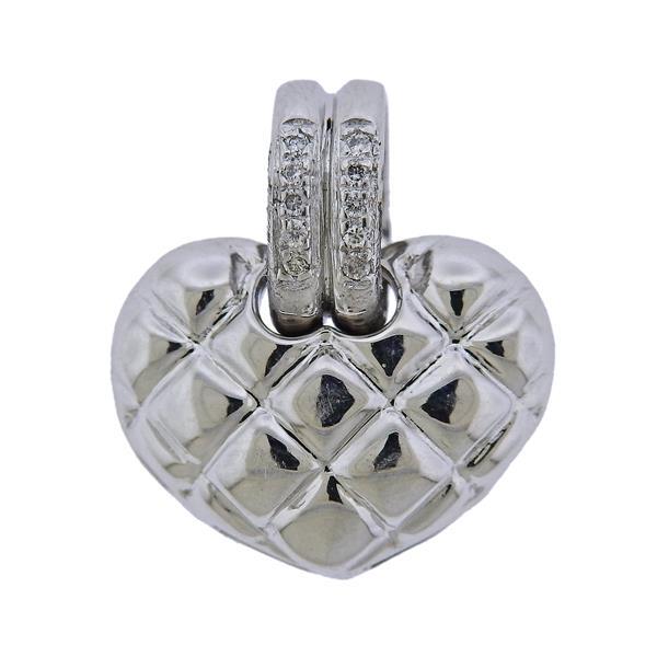 Chimento 18k Gold Diamond Heart Pendant Charm: METAL: 18k Gold. MEASUREMENTS: Pendant is 18mm x 15mm. GEMSTONES: Diamonds approx. 0.04ctw. Retail $1660. MARKED: Chimento, 408VI, 750. WEIGHT: 4.5 grams.Gemstones have not been graded for color and c