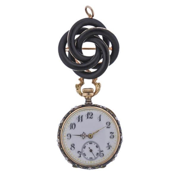 Antique 14k Gold Natural Pearl Lapel Pocket Watch: METAL: 14k Gold. MEASUREMENTS: Watch case is 26mm in diameter, overall size with the brooch - 62mm long. Decorated with black enamel and natural seed pearls. Minor enamel chips are present on the broo