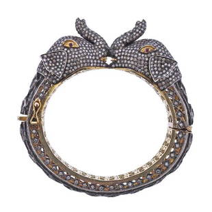 Indian Silver Gold Plated Diamond Elephant Bracelet: METAL: Silver/14k Gold Plated. MEASUREMENTS: Bracelet will fit approx. 7" wrist, elephant heads measure 19mm x 35mm x 20mm. GEMSTONES: Diamonds (one is missing), ruby eyes. TESTED: Silver/Gold