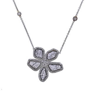 14k Gold Diamond Flower Pendant Necklace: METAL: 14k Gold. MEASUREMENTS: Necklace is 18" long, pendant is 28mm x 29mm. GEMSTONES: Diamonds approx. 0.90ctw, diamond slices (multiple stones have fractures). MARKED: 14k Italy. WEIGHT: 6.2