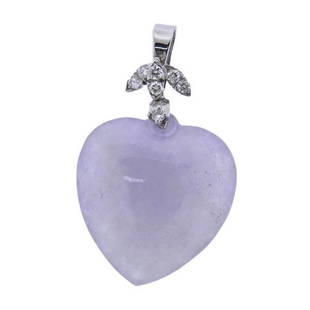 14k Gold Lavender Jade Diamond Heart Pendant: METAL: 14k Gold. MEASUREMENTS: Pendant is 39mm x 23mm. GEMSTONES: Heart lavender jade, diamonds approx. 0.20ctw. TESTED: 14k. WEIGHT: 8.3 grams.Gemstones have not been graded for color and clarity