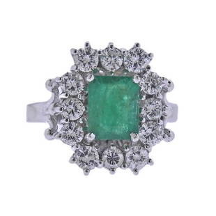 14k Gold Diamond Emerald Cocktail Ring: METAL: 14k Gold. MEASUREMENTS: Ring size 6, ring top is 17mm x 15mm. GEMSTONES: Emerald approx. 7.9 x 6.25mm (stone has multiple chips). Diamonds approx. 1.20ctw. MARKED: 14k. WEIGHT: 5.9