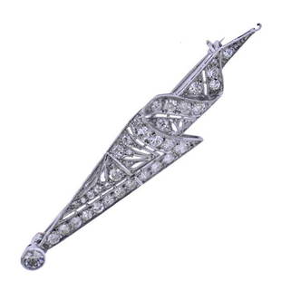 Art Deco Platinum Diamond Brooch Pin: METAL: Platinum. MEASUREMENTS: Brooch is 60mm x 15mm. End hook is broken. GEMSTONES: Diamonds approx.1.00ctw. TESTED: Plat. WEIGHT: 6 grams.Gemstones have not been graded for color and clarity ,and