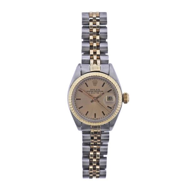 Rolex Datejust 14k Gold Steel Lady's Watch 6917: METAL: 14k Gold/ Stainless Steel. MEASUREMENTS: Case 26mm, jubilee two tone band will fit approx. 6.75" wrist. Gold tone dial with stick markers, rust on second's hand. MOVEMENT: Automatic, w