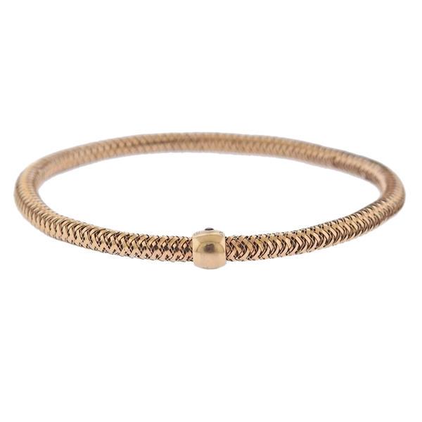 Roberto Coin Primavera 18k Gold Bracelet: METAL: 18k Rose Gold. MEASUREMENTS: Bracelet has a flexible design - will fit 7.5-8" long and is 5.9mm at widest point. MARKED: RC, 18Kt Italy, Ruby Maker's mark. WEIGHT: 6.4 grams. Retail $1