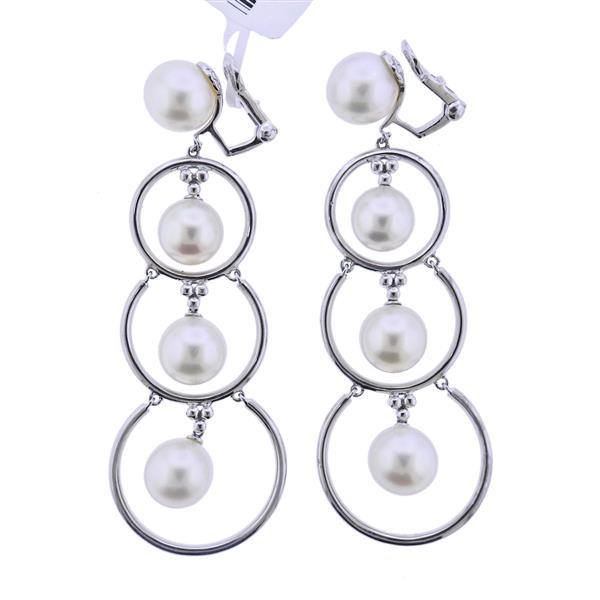 Assael 18k Gold Pearl Long Earrings: METAL: 18k Gold. GEMSTONES: Pearls 9.5-10mm. MEASUREMENTS: Earrings are 2.75" x 1". MARKED: 18k, 750 (with tag). WEIGHT: 27.9 grams. Retail $5000.Gemstones have not been graded for color and