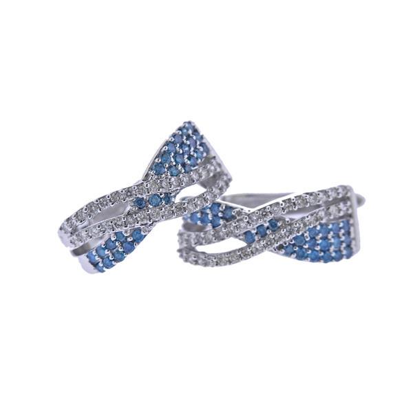 Kallati Gold Fancy White Diamond Hoop Earrings: METAL: 9k Gold. GEMSTONES: Diamonds approx. 0.50ctw. MEASUREMENTS: Earrings are 15mm x 6.2mm. MARKED: kallati 9k, 375. WEIGHT: 2.4 grams.Gemstones have not been graded for color and clarity ,and teste