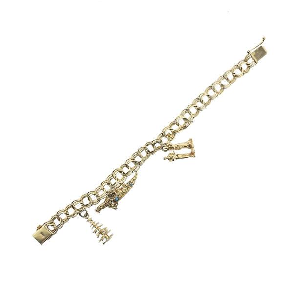 1960s 14k Gold Turquoise Charm Bracelet: METAL: 14k Gold. MEASUREMENTS: Bracelet is 7 3/8" long. GEMSTONES: Turquoise. MARKED: 14k on bracelet and 2 of 3 charms. WEIGHT: 26.6 grams.Gemstones have not been graded for color and clarity ,a