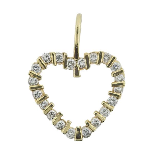 14k Gold Diamond Open Heart Pendant: METAL: 14k Gold. MEASUREMENTS: Pendant is 28mm x 23mm. GEMSTONES: Diamonds approx. 1.00ctw. TESTED: 14k. WEIGHT: 3.3 grams.Gemstones have not been graded for color and clarity ,and tested for clarity 