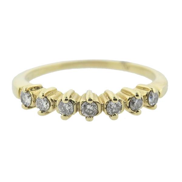 14k Gold Diamond Ring: METAL: 14k Gold. GEMSTONES: Diamonds approx. 0.20ctw. MEASUREMENTS: Ring size 6 1/2, ring band is 3.7mm wide. MARKED: Partially polished off 14k gold mark. WEIGHT: 2.3 grams. Gemstones have not been g