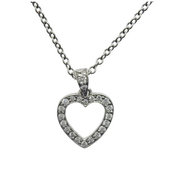 Tiffany & Co Metro Platinum Diamond Open Heart Pendant Necklace: METAL: Platinum. GEMSTONES: Diamonds approx. 0.11ctw. MEASUREMENTS: Necklace is 16" long, Pendant - 12mm long x 8mm wide. MARKED: Tiffany & Co PT950 marked only on chain. WEIGHT: 2.9 grams.Ge