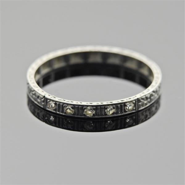 Art Deco Platinum Diamond Wedding Band Ring: METAL: Platinum. GEMSTONES: Diamonds approx. 0.05ctw. MEASUREMENTS: Ring size 6 3/4, ring band is 2.3mm wide. TESTED: Plat. WEIGHT: 1.7 grams.Gemstones have not been graded for color and clarity ,and