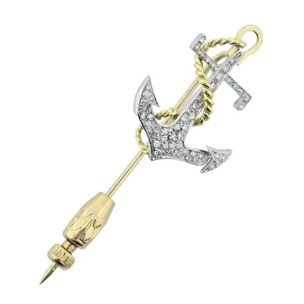18k Gold Diamond Anchor Stick Pin: METAL: 18k Gold. MEASUREMENTS: Pin is 58mm long, top (anchor) is 30mm x 23mm. GEMSTONES: Diamonds approx. 0.50ctw. MARKED: 750. WEIGHT: 6.5 grams.Gemstones have not been graded for color and clarity ,