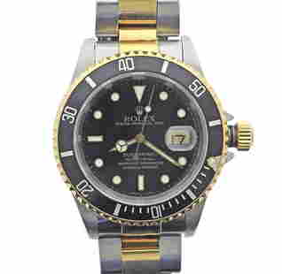 Rolex Submariner Date Two Tone Automatic Watch 16613: METAL: 18k Gold/ Stainless Steel. MEASUREMENTS: Case 40mm, two tone oyster band has two removable links. MOVEMENT: Automatic - working order. Ref. 16613, Ser # W860***. Circa 1997. Comes with box.Watc