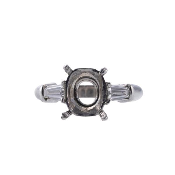 Platinum Diamond Engagement Ring Setting: METAL: Platinum. MEASUREMENTS: Ring size approx. 6.5-6 3/4, center will fit approx. 10mm x 8.5mm stone. Ring has to been resized previously. GEMSTONES: Two tapered baguette diamonds. MARKED: Pt950. WE