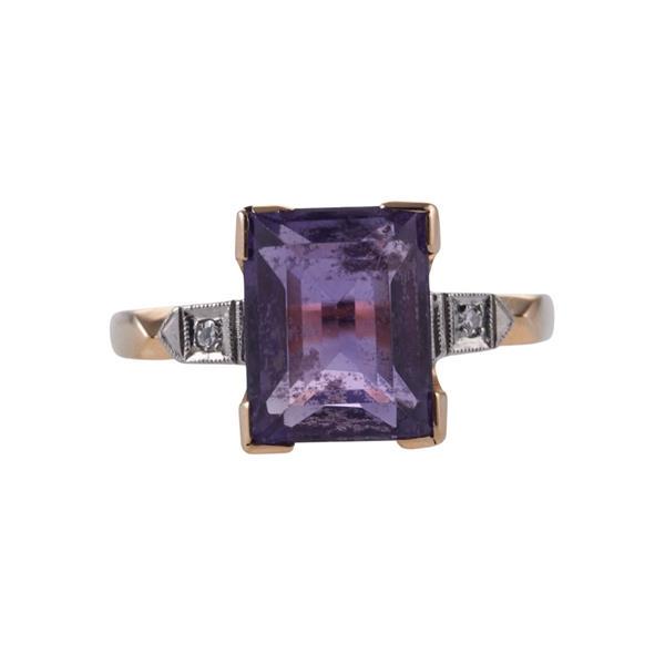 14k Gold Amethyst Diamond Ring: METAL: 14k Gold. MEASUREMENTS: Ring size 7.75. GEMSTONES: Amethyst - 10.1 x 8mm, Diamonds. MARKED: 14k. WEIGHT: 4 grams.Gemstones have not been graded for color and clarity ,and tested for clarity and