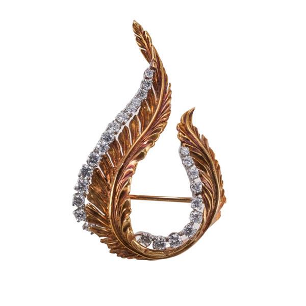 McTeigue 1960s 18k Gold Platinum Diamond Brooch: METAL: 18k Gold/ Platinum. MEASUREMENTS: Brooch is 45mm x 27mm. GEMSTONES: Diamonds approx. 1.00ctw. MARKED: Irid. Plat. 18k, McT hallmark. WEIGHT: 10.4 grams.Gemstones have not been graded for color