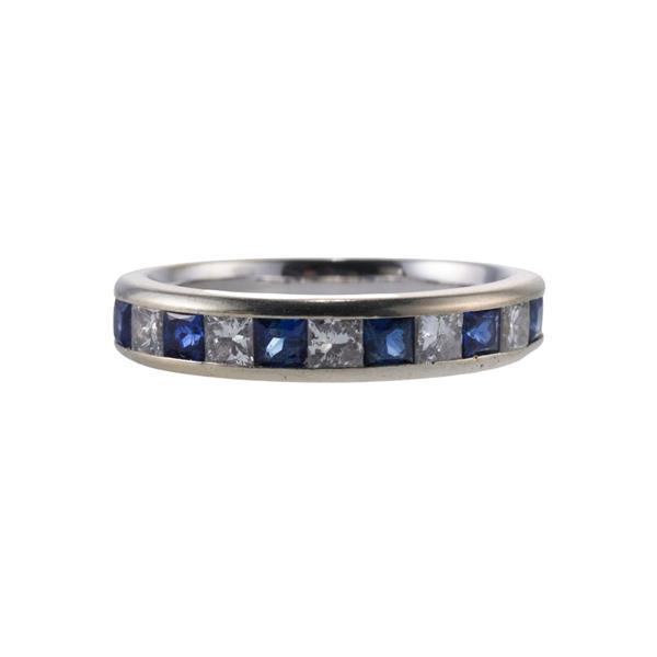 14k Gold Diamond Sapphire Band Ring: METAL: 14k Gold. GEMSTONES: Diamonds approx. 0.30ctw. Sapphires. MEASUREMENTS: Ring size 5 3/4, band is 4mm at widest point. MARKED: Maker's mark 14k. WEIGHT: 3.4 grams.Gemstones have not been gra