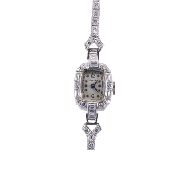 Concord 1950s Midcentury Platinum Gold Diamond Lady's Watch: METAL: 18k Gold bracelet/ Platinum case. MEASUREMENTS: Case 14.5mm x 25mm. Bracelet is broken - total length 6". Case and bracelet decorated with diamonds - approx. 0.90ctw. MOVEMENT: Manual wind