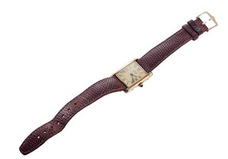 Must de Cartier Tank Vermeil Manual Wind Watch: METAL; Vermeil. MOVEMENT: Case 24mm excl crown x 30mm. Bracelet and buckle not original. Yellow tone dial with black Roman markers. MOVEMENT: Manual wind, working order.Watches are guaranteed to be in