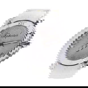 Chopard Happy Sport Floating Diamond Watch 8475: METAL: Stainless Steel. MEASUREMENTS: Case 36mm excl crown, With rubber Chopard band , steel buckle. Guilloche dial with 5 floating diamonds. MOVEMENT: Quartz - working order. Ref. 8475. Comes with CO