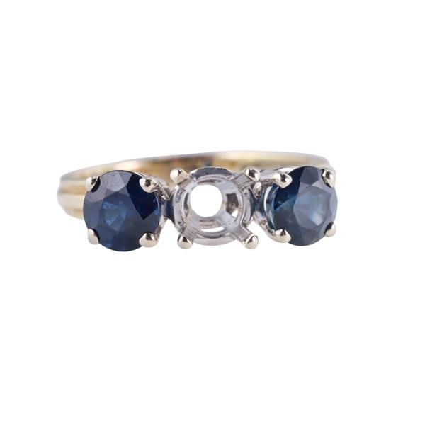18k Gold Sapphire Engagement Ring Setting: METAL: 18k Gold. GEMSTONES: Sapphires. MEASUREMENTS: Ring size 6, center will fit approx. 5mm stone. MARKED: Maker's mark 18k. WEIGHT: 3.1 grams.Gemstones have not been graded for color and clarit